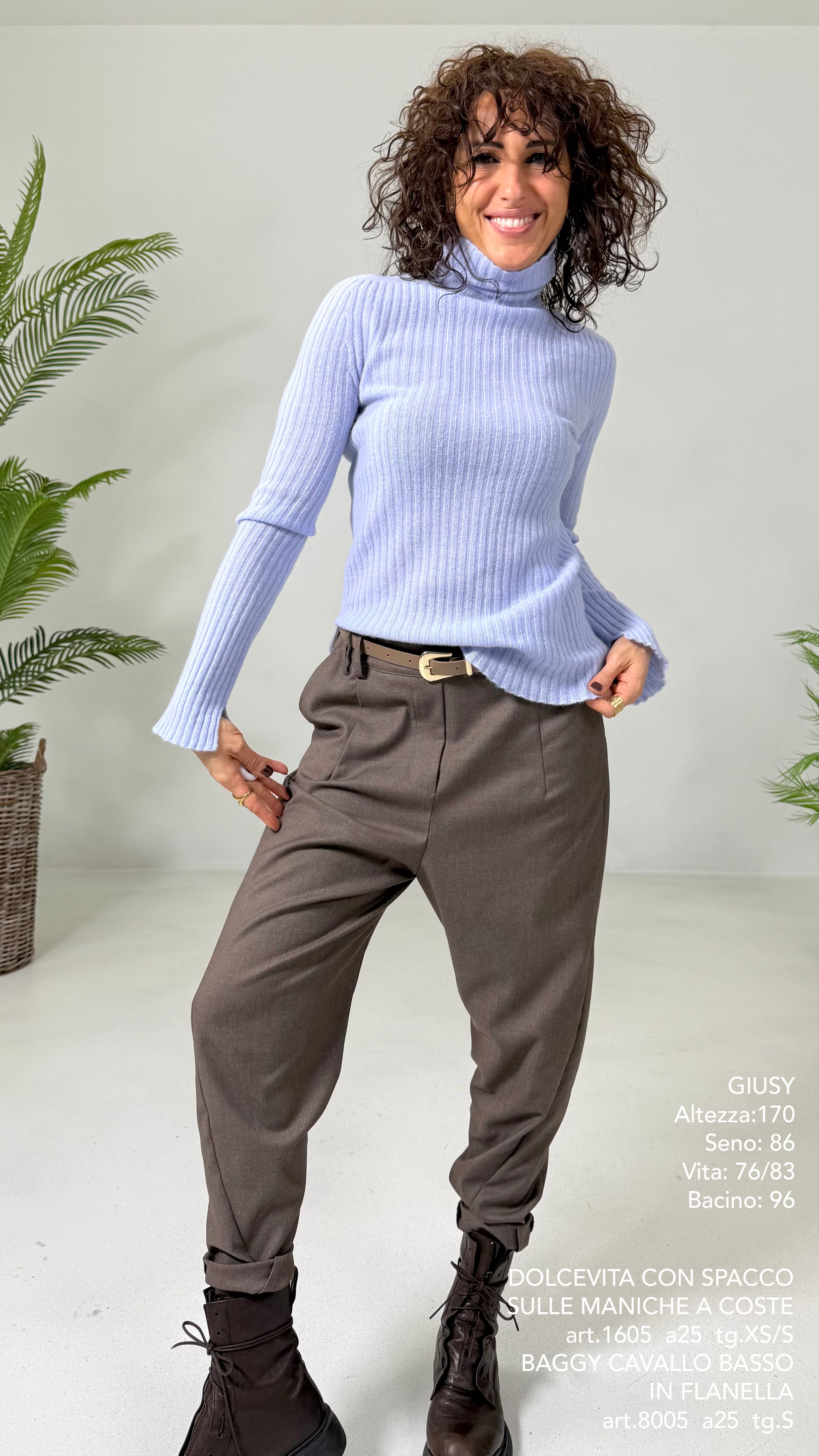 DOLCEVITA CON SPACCO SULLE MANICHE A COSTE IN LANA CARDATA