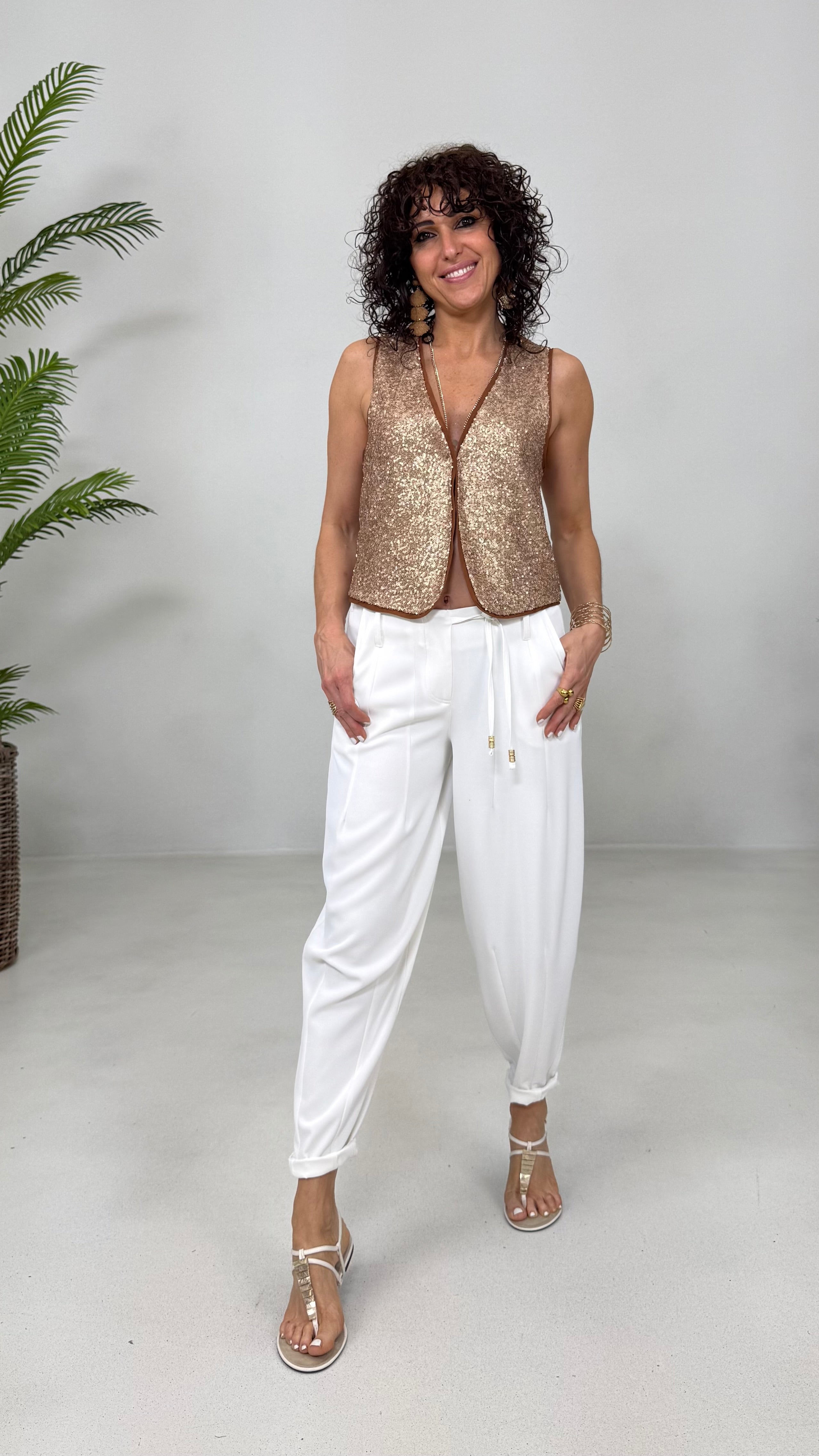 GILET IN PAILLETTES E MUSSOLA