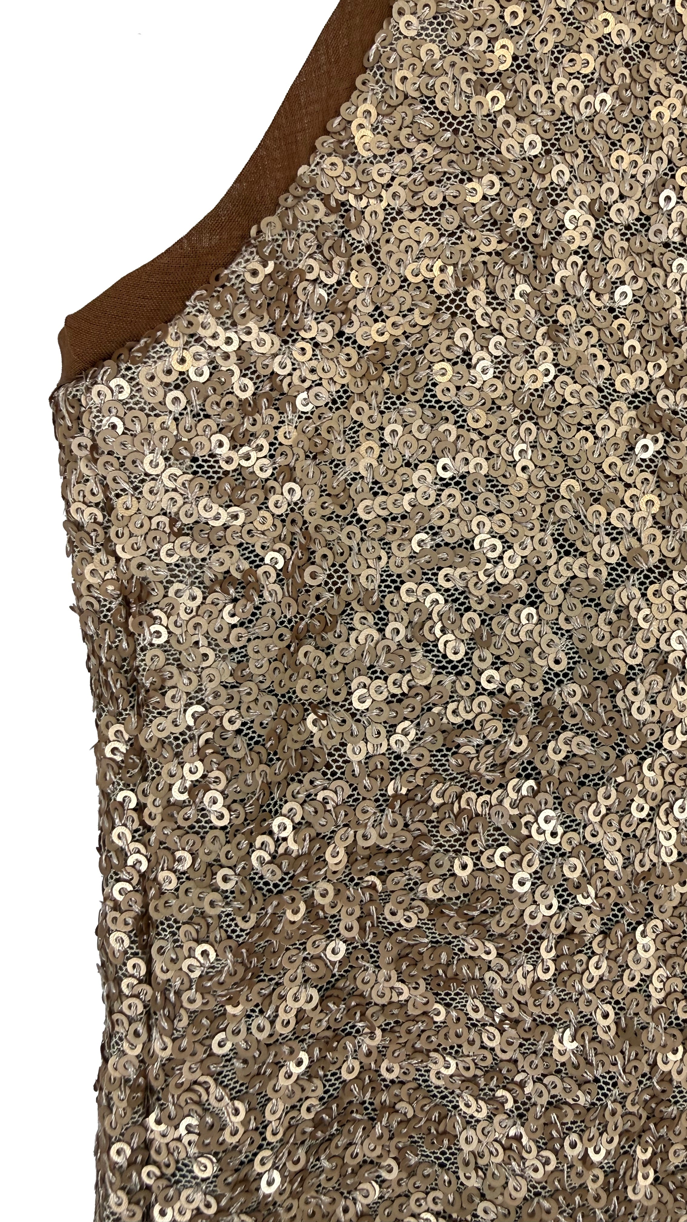 GILET IN PAILLETTES E MUSSOLA