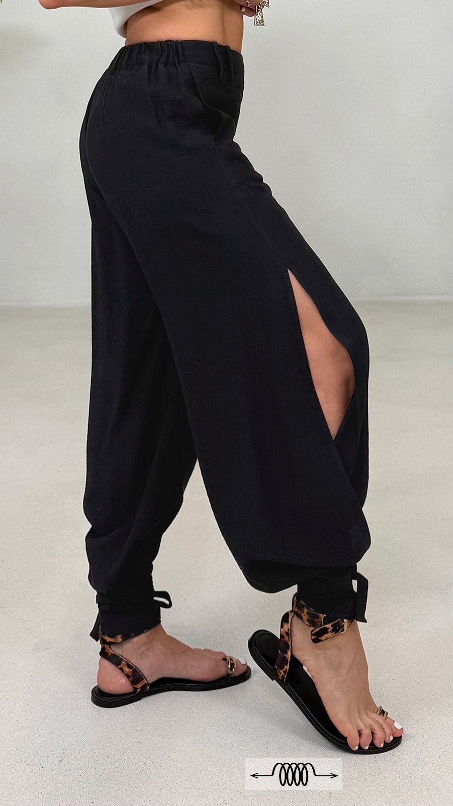 PANTALONE ODALISCA CON SPACCHI IN VISCOSA CRASH