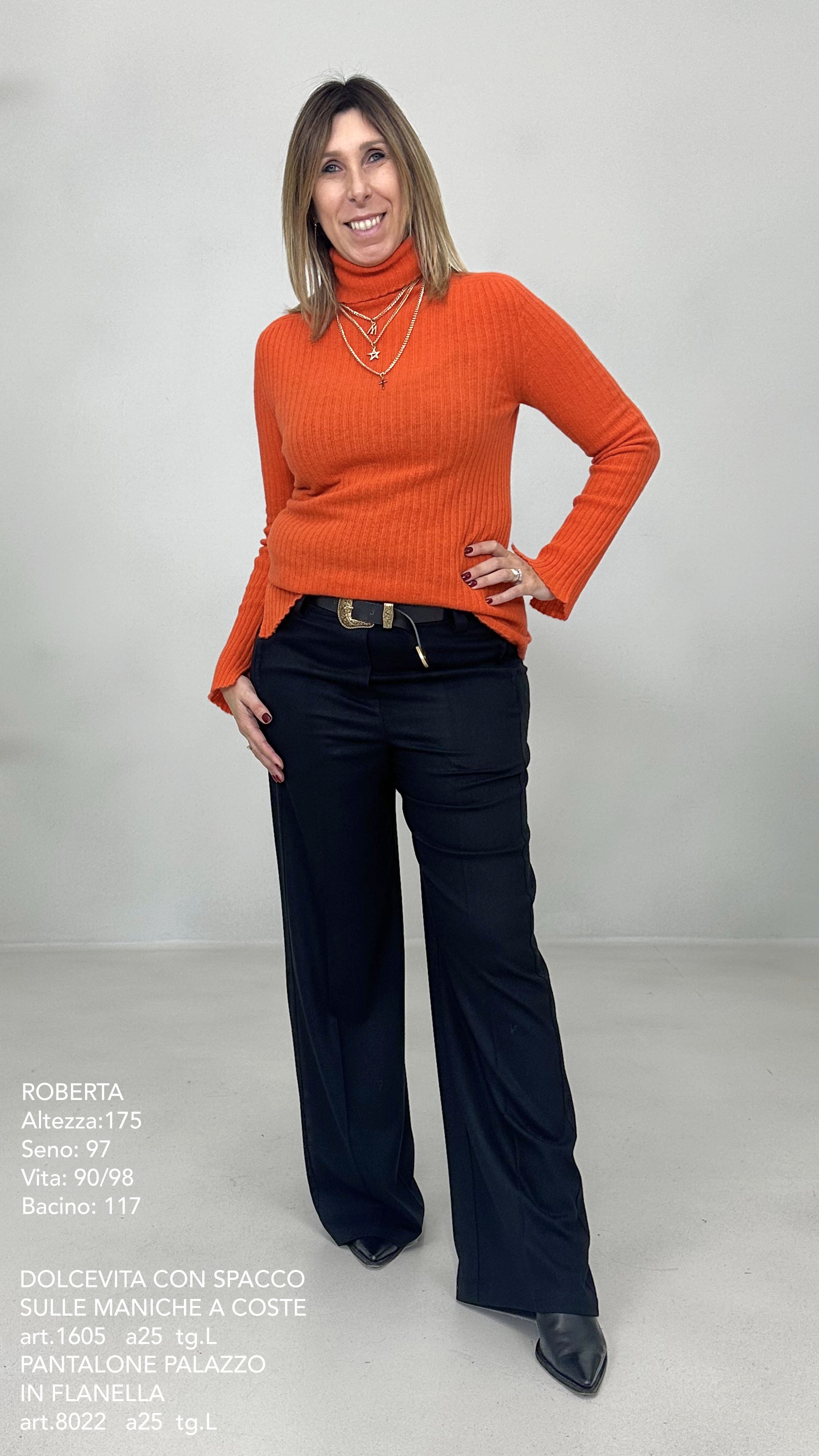 DOLCEVITA CON SPACCO SULLE MANICHE A COSTE IN LANA CARDATA