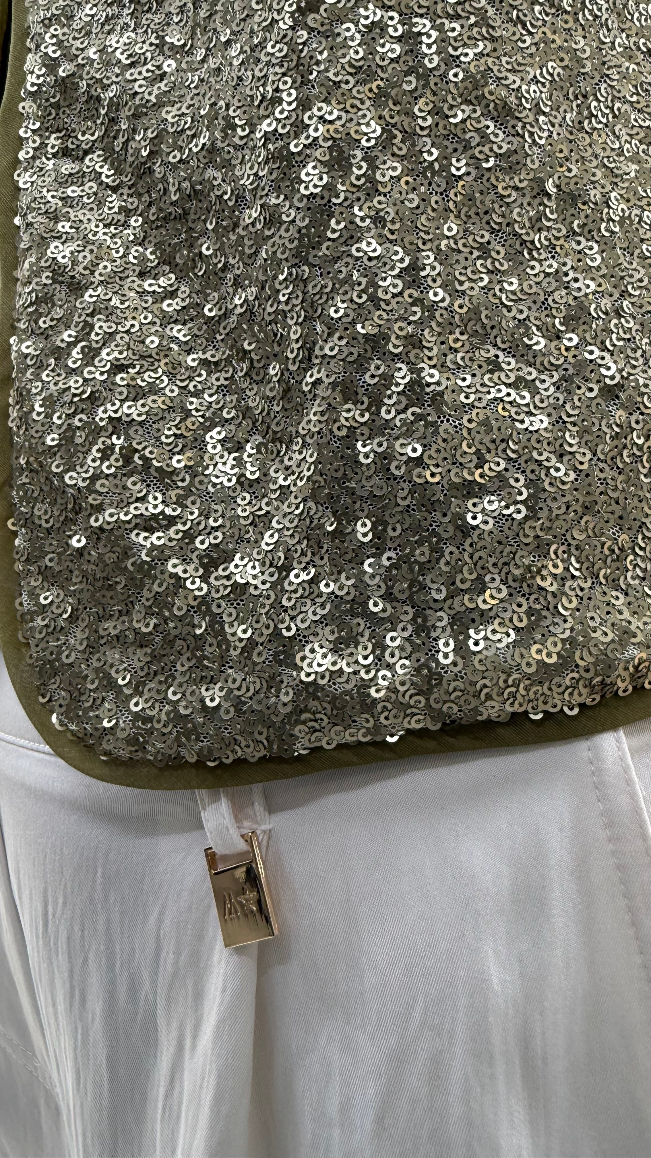 GILET IN PAILLETTES E MUSSOLA