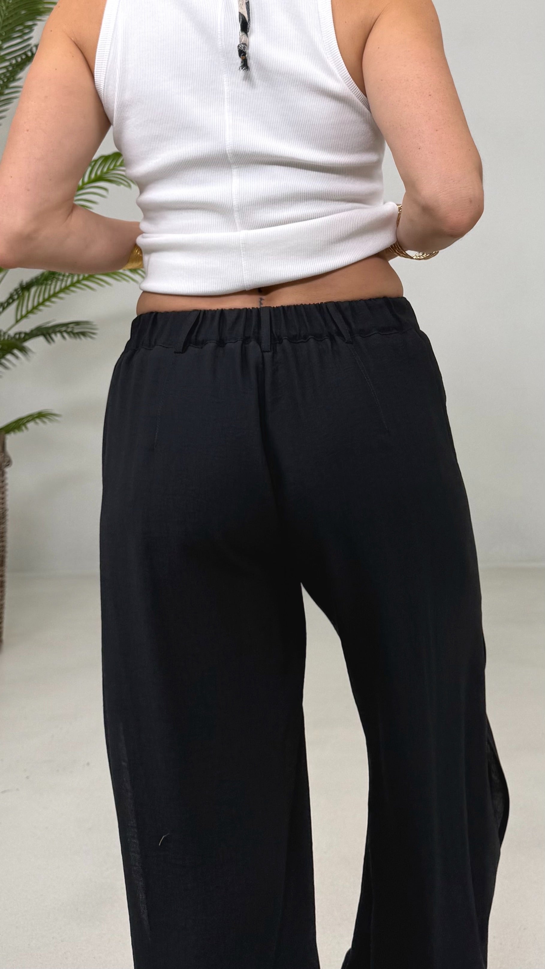 PANTALONE ODALISCA CON SPACCHI IN VISCOSA CRASH